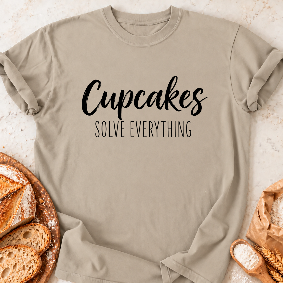 Cupcakes Solve Everything T-Shirt — Sand